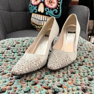 Stuart weitzman size 8 1/2B. Lace and beaded details at toe.  Silver metallic.